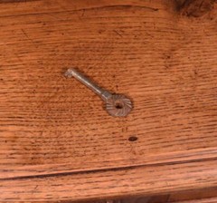 Antique French Cabinet Highly Carved Chestnut Wood w/Boy Girl and Bird (Macaw)
