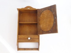 Small Antique Wooden Hanging Cabinet with Oval Mirror and Carved Floral Details