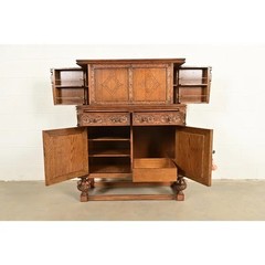 Antique English Jacobean Carved Oak Bar Cabinet, Circa 1920s