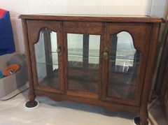 solid oak curio cabinet glass shelf glass and mirrored
