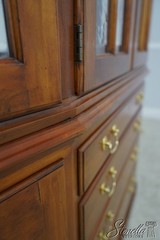 62635: HENKEL HARRIS Cherry Distressed Finish China Cabinet