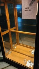 used lighted curio cabinet glass with bevel edge around the glass