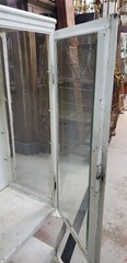 Pair of Steel Medical Cabinets with Beveled & Wavy Glass on Cabriole Legs