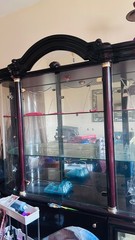 Elegant glass China closet with all China included