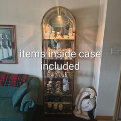 vintage arched brass and glass curio cab.,Hollywood Regency and mid-century mode
