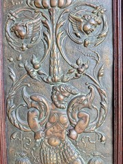 VICTORIAN OAK CABINET W FIGURAL BRASS PANELS