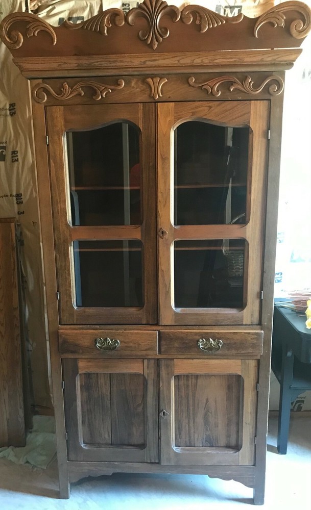 Antique China Cabinet over 100 years old in good shape. All hardware original