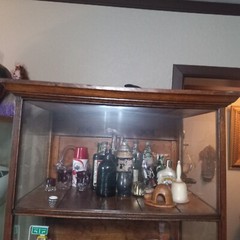 Antique oak four shelf cheese cabinet from country store