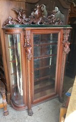 R.J. HORNER CARVED LADY MAHOGANY CHINA CABINET