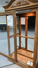 used lighted curio cabinet glass with bevel edge around the glass