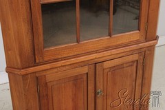 73584: Bench Made Chippendale Style Walnut Corner Cabinet