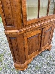 DR Dimes corner cupboard in strong tiger maple for Colonial Williamsburg.