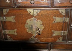 Antique Asian Wooden Apothecary Cabinet: 21 Drawers, 2-Door Cabinet, Brass Pulls