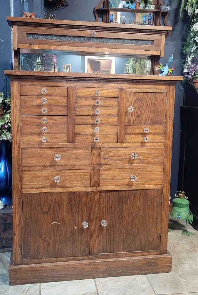 Antique wood dental medical industrial cabinet.