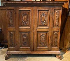 19th c Large Italian Baroque Style Two Door Carved Oak Cabinet with Paw Feet