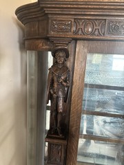 Unique and Unusual Curved Glass China Cupboard with Carved Figures C.1900