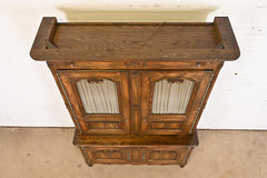 Baker Furniture French Provincial Louis XV Carved Oak Lighted Bar Cabinet, 1960s