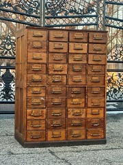 Large solid wood, antique multi drawer card catalog cabinet