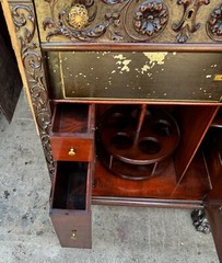 R.J. HORNER CARVED GRIFFIN LIQUOR BAR CABINET