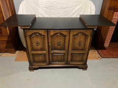 VTG (60’s) FLIP TOP DRY BAR CABINET W/GLASS SET /CASTERS / WINE RACK – ORIG OWNR