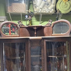 Antique Tiger Oak Corner Curio Cabinet. Ornate details, curved glass doors.