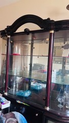 Elegant glass China closet with all China included
