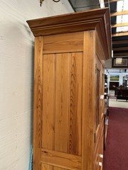 LARGE PINE FOUR-DOOR LARDER CUPBOARD