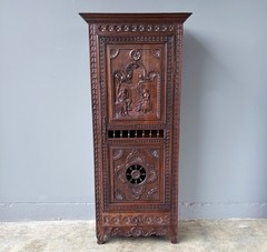 71″ Tall French Antique Breton Cabinet in Solid Chestnut Wood w/Carved Figures