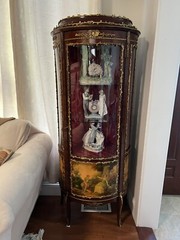 antique curved glass curio cabinet