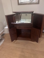 George Zee & Co. Bar Cabinet Brown Wood Mirrored Interior Bottle Storage