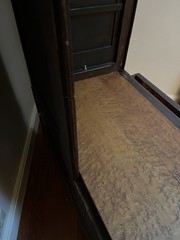 antique display cabinet with beveled glass door