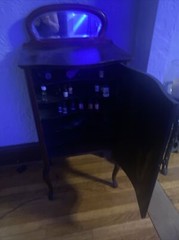 Antique mahogany music cabinet